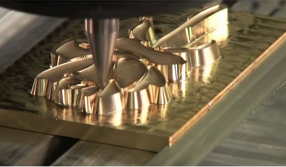 Chạm khắc hoa văn bằng máy CNC kim loại